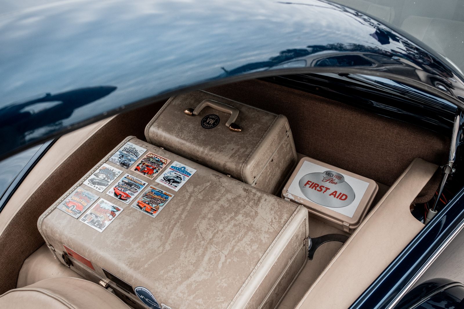 A neatly arranged emergency car kit in the boot of a vehicle